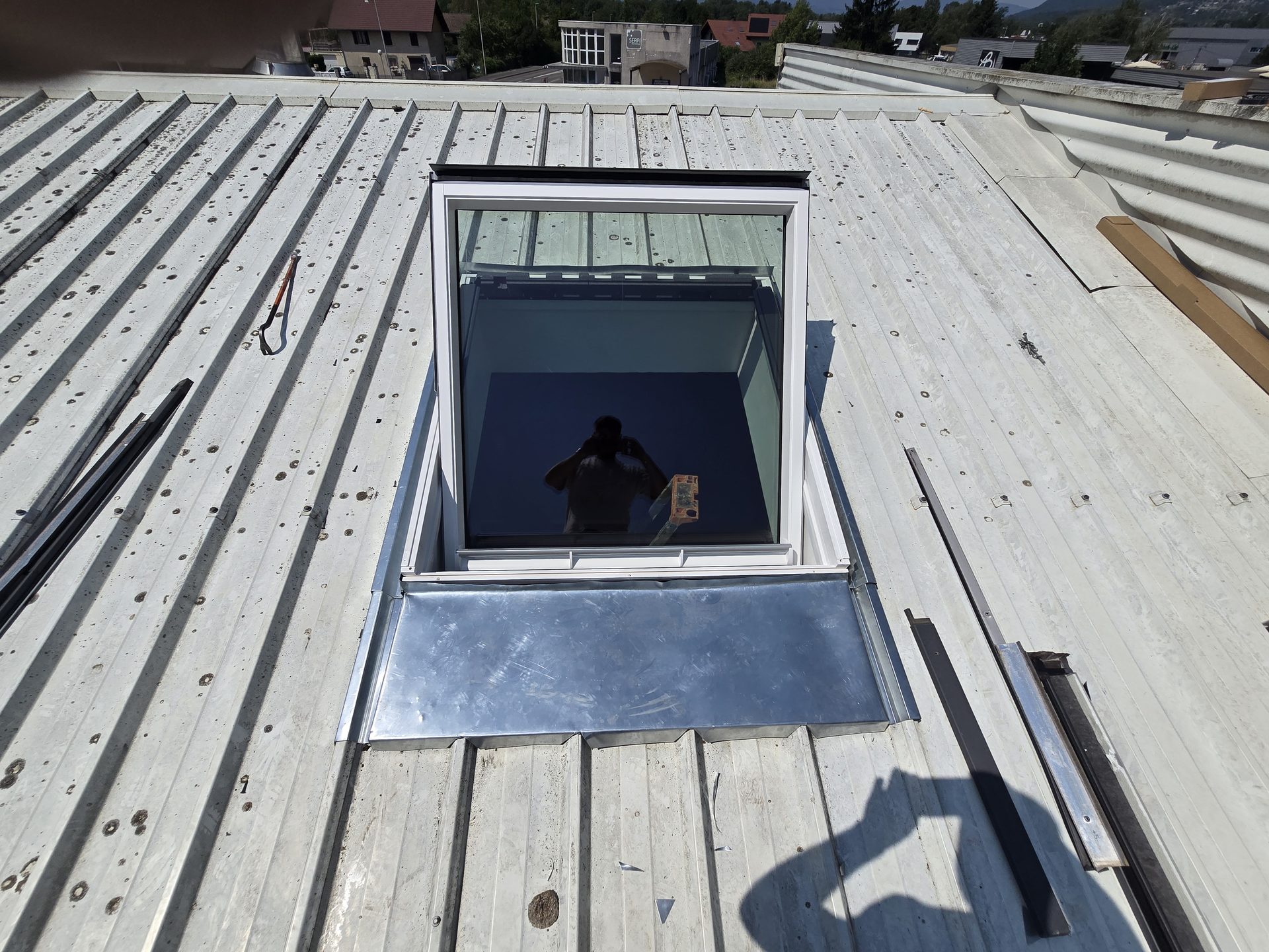 Finition d'un Velux et de son raccord d'étanchéité